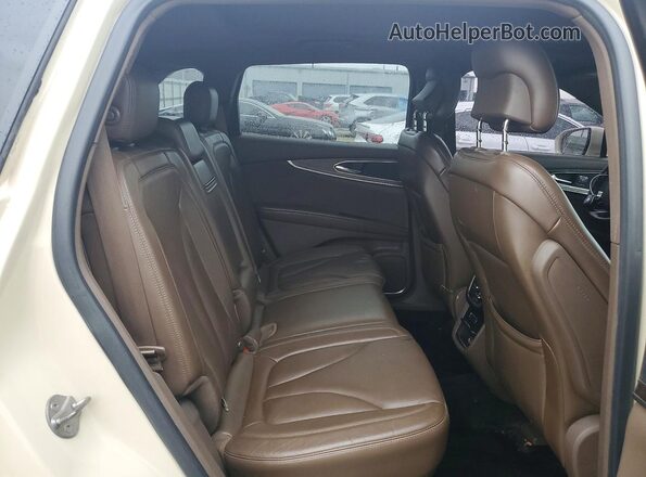 2LMTJ8LP1GBL50053 2016 LINCOLN MKX Beige Rear interior view