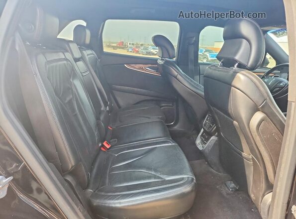 2LMTJ8LP2GBL67282 2016 LINCOLN MKX Black Rear seats view