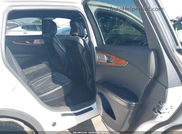 2LMTJ8LP3GBL21122 2016 LINCOLN MKX White Widok naklejki z numerem VIN