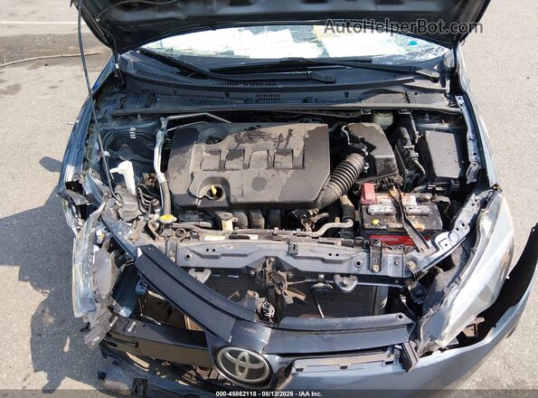 2T1BURHE0HC780553 2017 TOYOTA COROLLA Light Blue Widok z tyłu