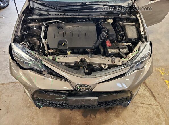 2T1BURHE0HC819478 2017 TOYOTA COROLLA Tan Вид задньої частини салону