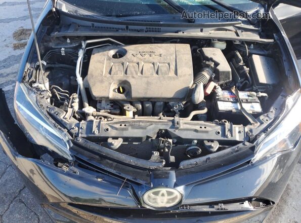 2T1BURHE0JC049840 2018 TOYOTA COROLLA Black Vista interior trasera