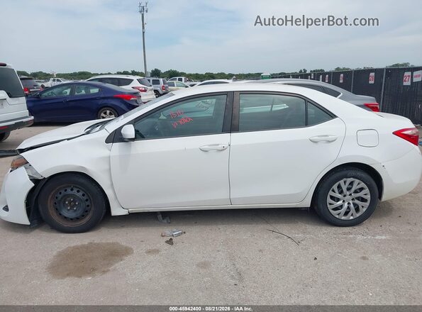 2T1BURHE0JC070090 2018 TOYOTA COROLLA White Vista interior trasera