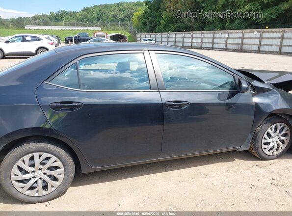 2T1BURHE0KC186049 2019 TOYOTA COROLLA Black Vista interior trasera