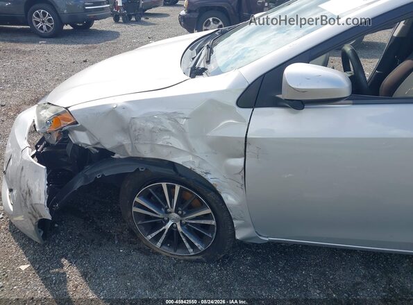 2T1BURHE0KC197990 2019 TOYOTA COROLLA Серебряный Вид спереди