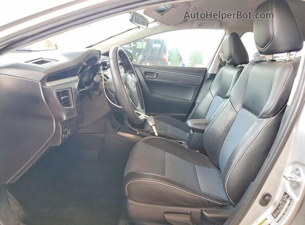 2T1BURHE1GC574432 2016 TOYOTA COROLLA Серебряный Вид салона спереди