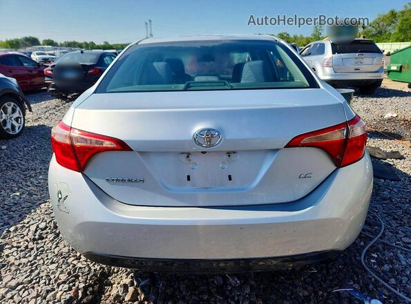 2T1BURHE1HC748291 2017 TOYOTA COROLLA Silver Вид ззаду