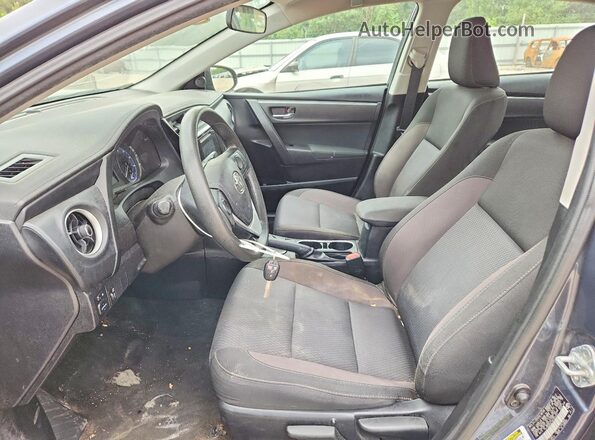 2T1BURHE1HC930251 2017 TOYOTA COROLLA Синий Вид салона спереди