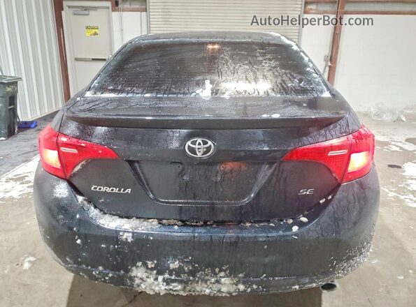 2T1BURHE1JC019469 2018 TOYOTA COROLLA Black Rear view