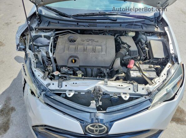 2T1BURHE1JC038488 2018 TOYOTA COROLLA Silver უკანა სალონის ხედი