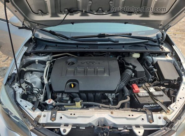 2T1BURHE1JC064329 2018 TOYOTA COROLLA Silver Widok wnętrza z tyłu