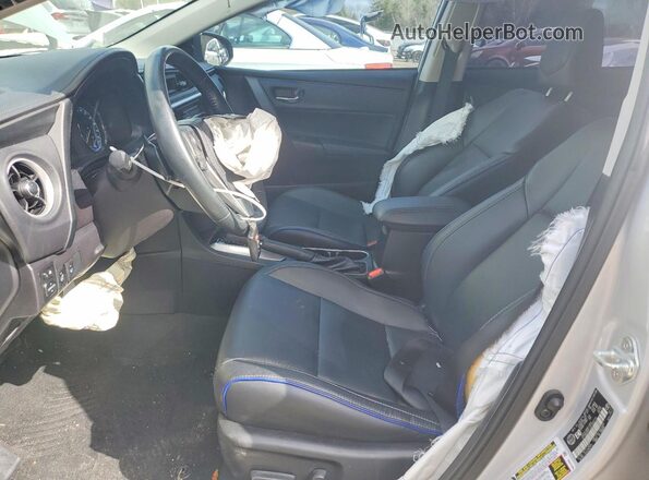 2T1BURHE1JC103713 2018 TOYOTA COROLLA Silver Front interior view