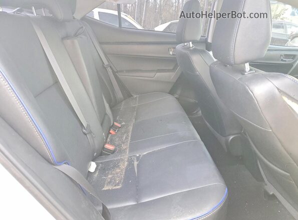 2T1BURHE1JC103713 2018 TOYOTA COROLLA Silver Rear seats view