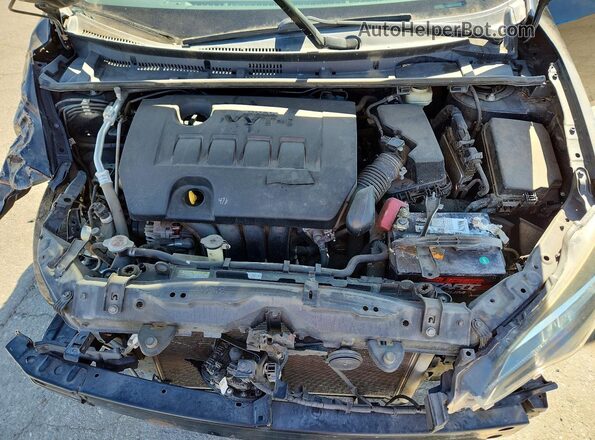 2T1BURHE1JC105459 2018 TOYOTA COROLLA Black Vista interior trasera