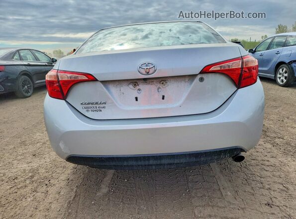 2T1BURHE1KC170393 2019 TOYOTA COROLLA Silver უკანა ხედი