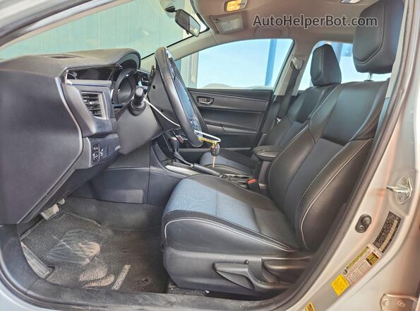 2T1BURHE2GC630894 2016 TOYOTA COROLLA Серебряный Вид салона спереди