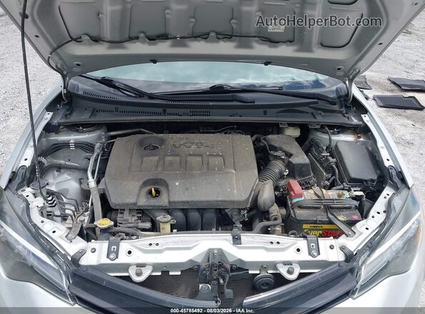 2T1BURHE2HC772051 2017 TOYOTA COROLLA Серебряный Вид сзади