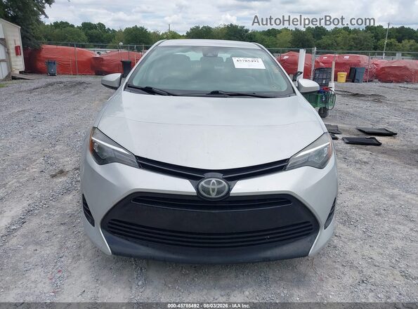 2T1BURHE2HC772051 2017 TOYOTA COROLLA Серебряный Вид задней части салона