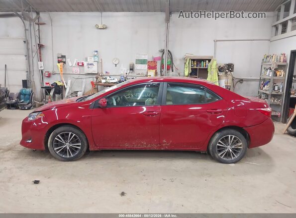2T1BURHE2HC912146 2017 TOYOTA COROLLA Burgundy Vista interior trasera