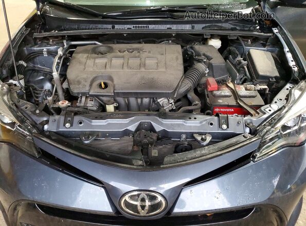 2T1BURHE2HC914060 2017 TOYOTA COROLLA Gray Rear interior view