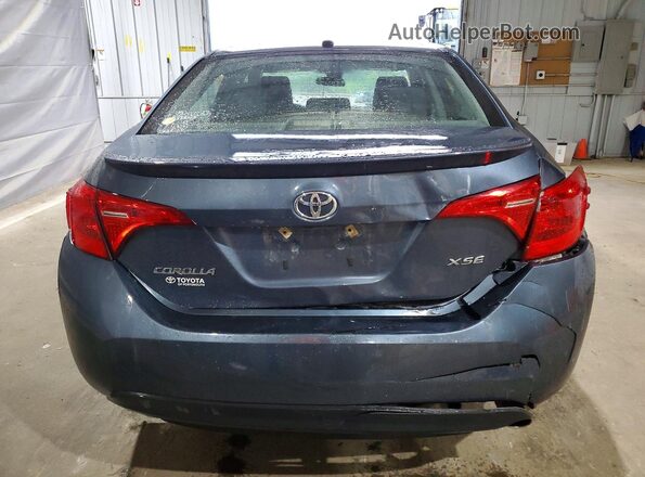 2T1BURHE2HC914060 2017 TOYOTA COROLLA Gray Rear view