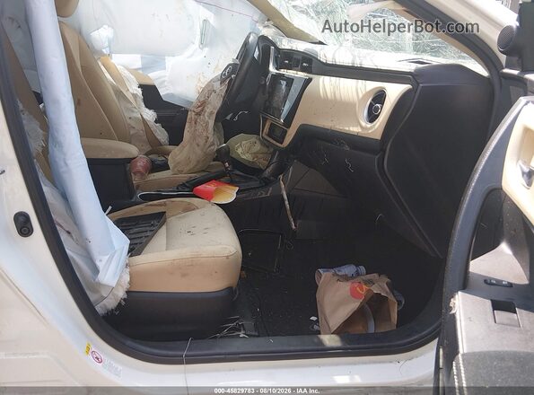 2T1BURHE2HC941968 2017 TOYOTA COROLLA White Front interior view