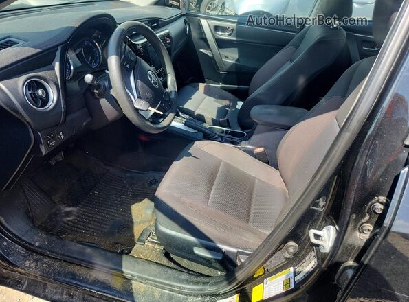 2T1BURHE2HC951299 2017 TOYOTA COROLLA Черный Вид салона спереди