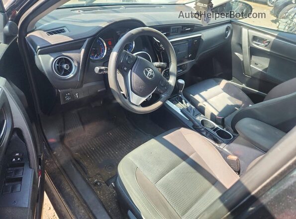 2T1BURHE2HC951299 2017 TOYOTA COROLLA Черный Вид панели приборов