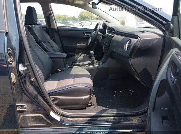 2T1BURHE2JC010022 2018 TOYOTA COROLLA Dark Blue Vista interior delantera