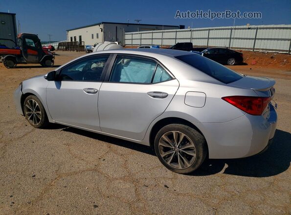 2T1BURHE2JC065070 2018 TOYOTA COROLLA Silver Tył lewy