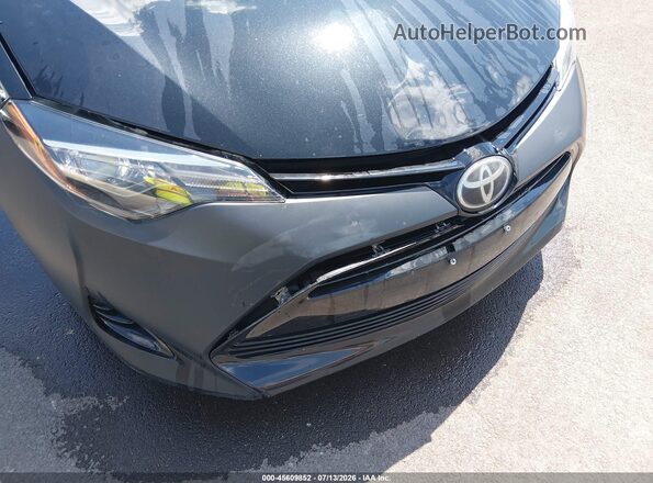 2T1BURHE2JC986124 2018 TOYOTA COROLLA Black Front view