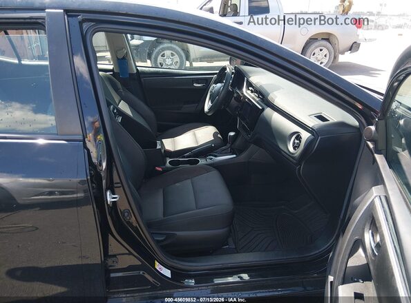2T1BURHE2JC986124 2018 TOYOTA COROLLA Black Front interior view