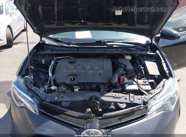 2T1BURHE2JC986124 2018 TOYOTA COROLLA Black Rear view