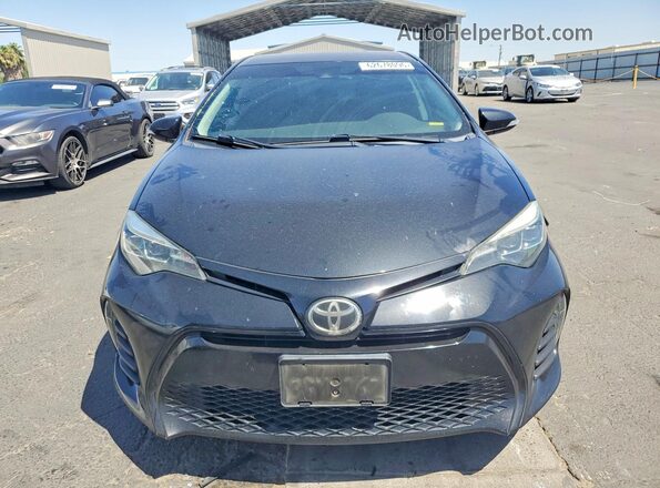 2T1BURHE2KC176820 2019 TOYOTA COROLLA Black Front view