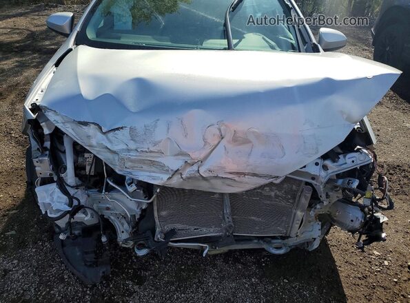 2T1BURHE2KC205751 2019 TOYOTA COROLLA Silver Rear interior view
