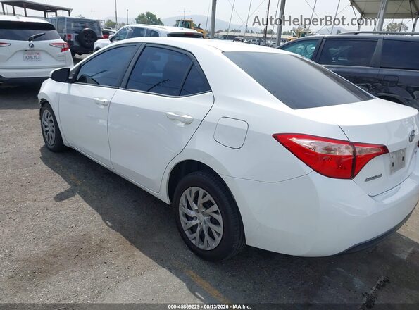 2T1BURHE2KC231962 2019 TOYOTA COROLLA White Rear left