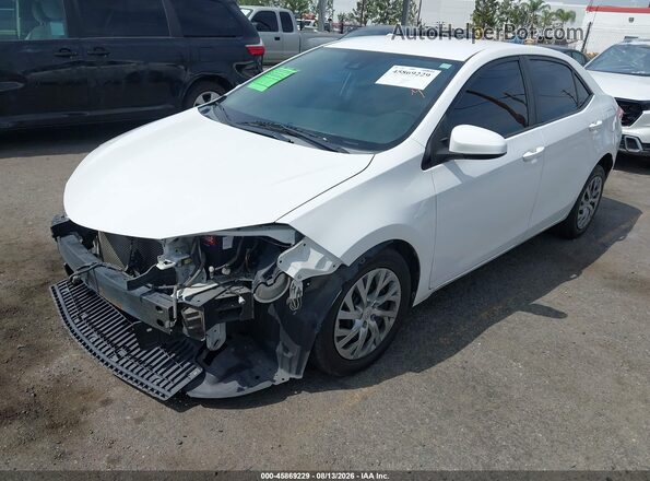 2T1BURHE2KC231962 2019 TOYOTA COROLLA White Front left