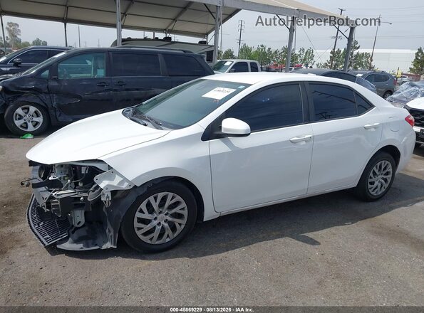 2T1BURHE2KC231962 2019 TOYOTA COROLLA White 