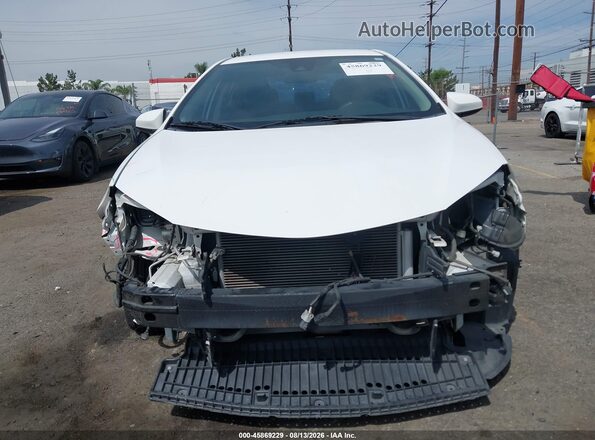 2T1BURHE2KC231962 2019 TOYOTA COROLLA White Rear interior view