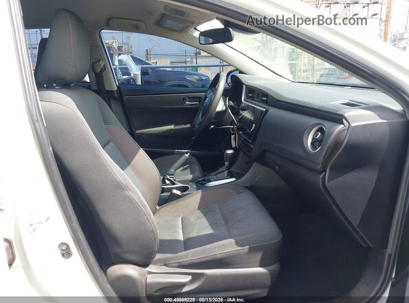 2T1BURHE2KC231962 2019 TOYOTA COROLLA White Front interior view