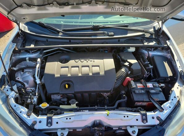 2T1BURHE3GC734861 2016 TOYOTA COROLLA Silver Vista interior trasera