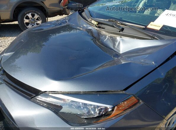2T1BURHE3HC935841 2017 TOYOTA COROLLA Серый Вид спереди