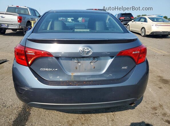 2T1BURHE3JC114082 2018 TOYOTA COROLLA Gray Vista trasera