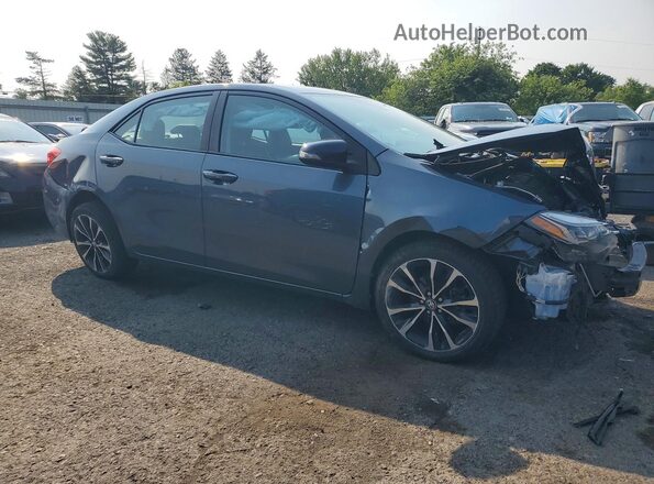 2T1BURHE3JC114082 2018 TOYOTA COROLLA Gray Delantero derecho