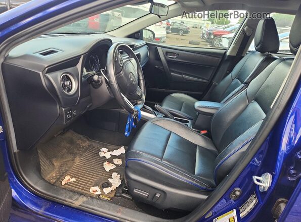 2T1BURHE3JC996869 2018 TOYOTA COROLLA Синий Вид салона спереди
