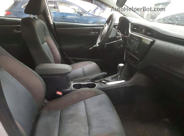 2T1BURHE3KC242386 2019 TOYOTA COROLLA Серебряный Вид салона спереди