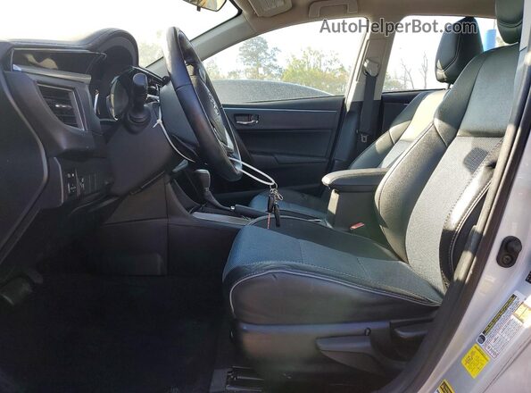 2T1BURHE4GC568558 2016 TOYOTA COROLLA Серебряный Вид салона спереди