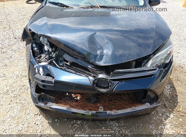 2T1BURHE4HC910639 2017 TOYOTA COROLLA Black Front view