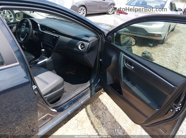 2T1BURHE4HC910639 2017 TOYOTA COROLLA Black Front interior view