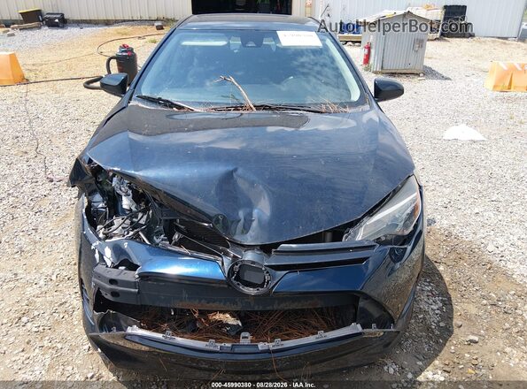 2T1BURHE4HC910639 2017 TOYOTA COROLLA Black Rear interior view